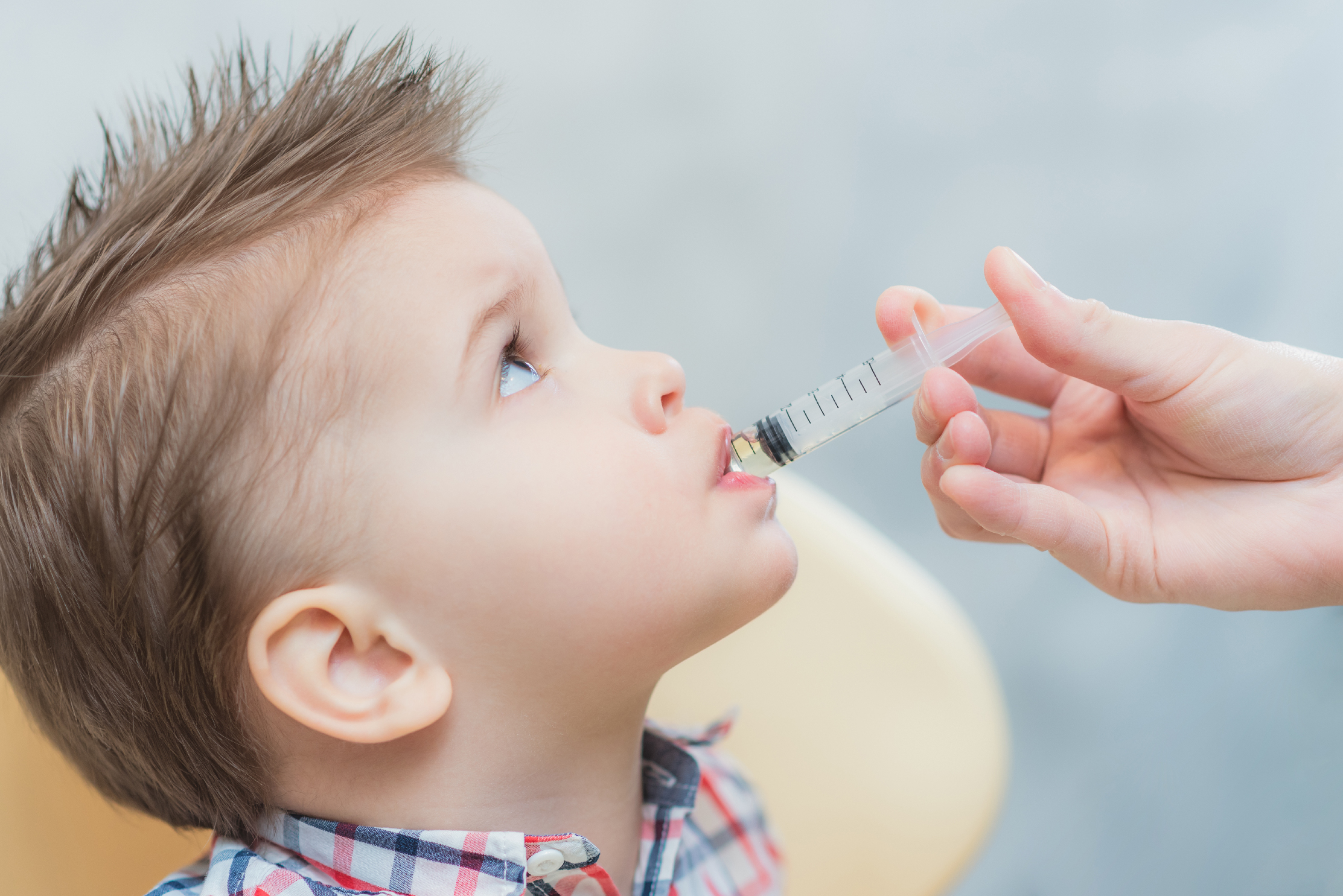 Young child receiving meds.